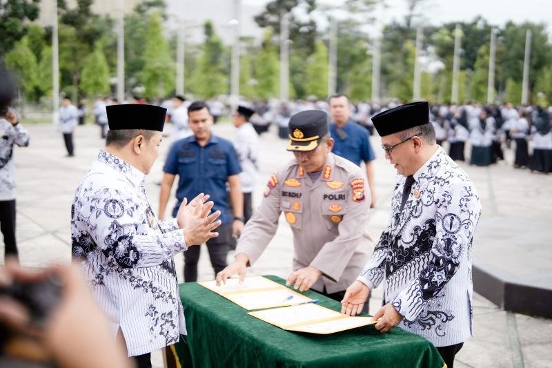 Tandatangani MoU PGRI dan Polda Riau: Perisai Baru untuk Keamanan Guru